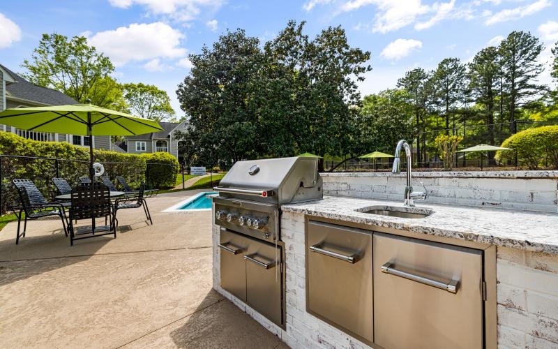 a kitchen with a sink and a table